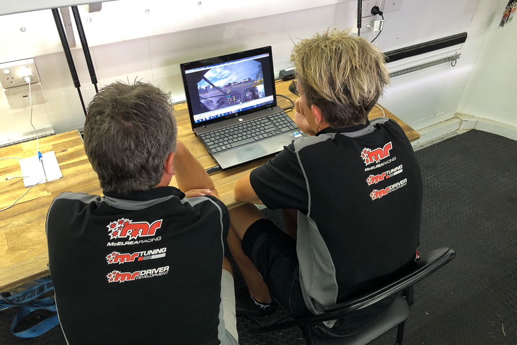 Warren Luff doing video analysis and driver coaching with Tim Miles at the Aust Grand Prix