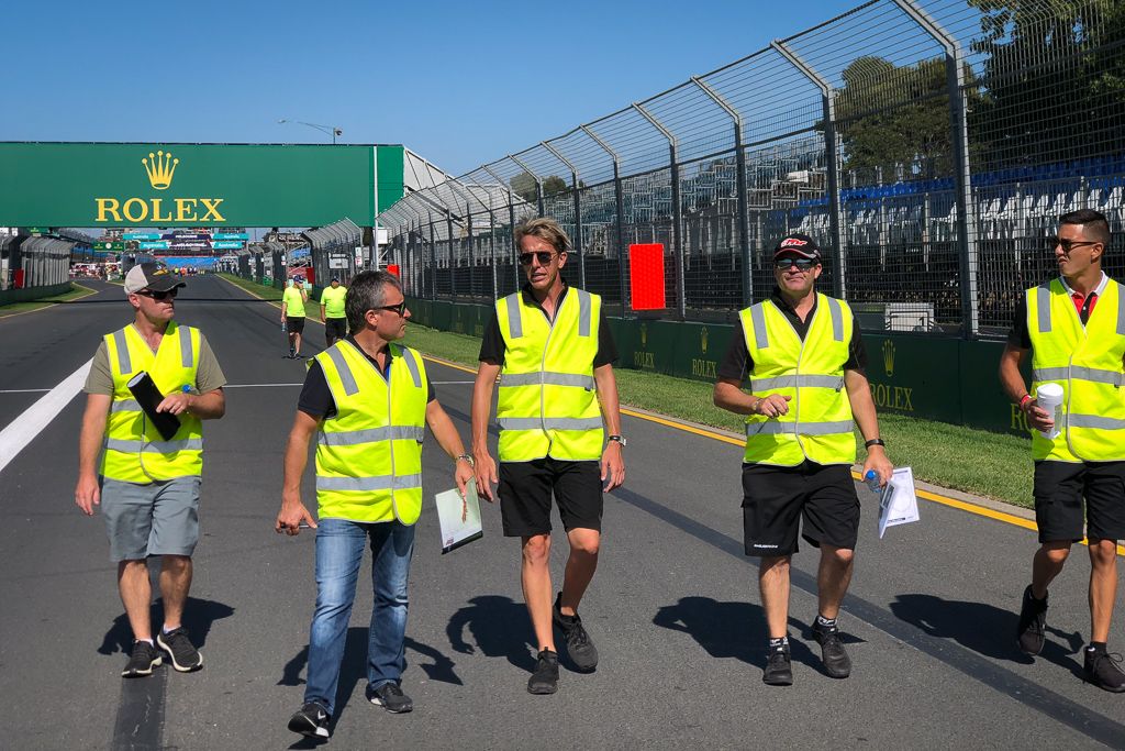 McElrea Racing drivers walk the circuit before the event at the Aust Grand Prix